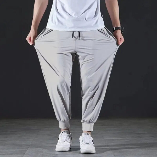 Summer Quick-drying Ice Silk Casual Pants Men's Ultra-thin Elastic Nine-point Pants Loose Drape Solid Beam Feet Pants 7XL - Image 2